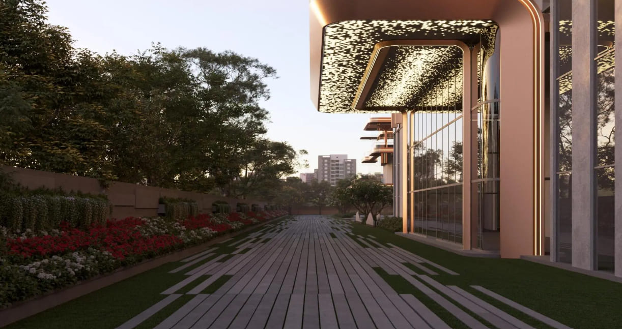 Landscaped outdoor walkway and modern façade at Ashtech Presidential