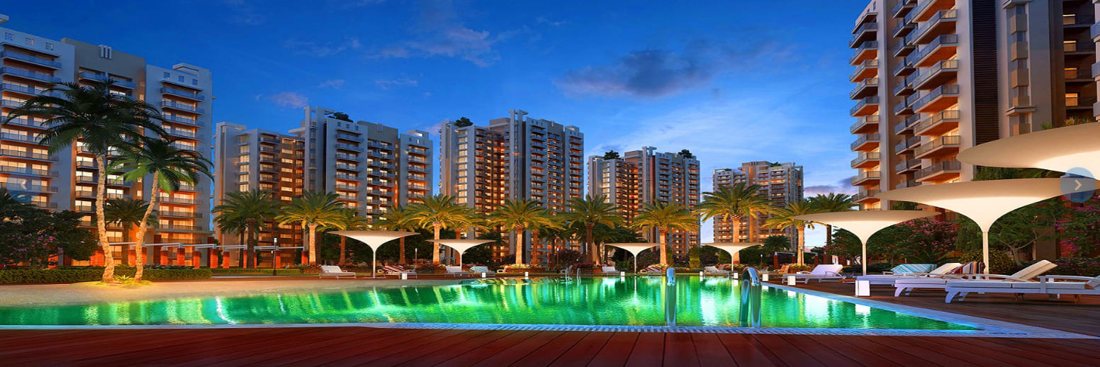 Gaur Legacy building exterior with landscaped gardens