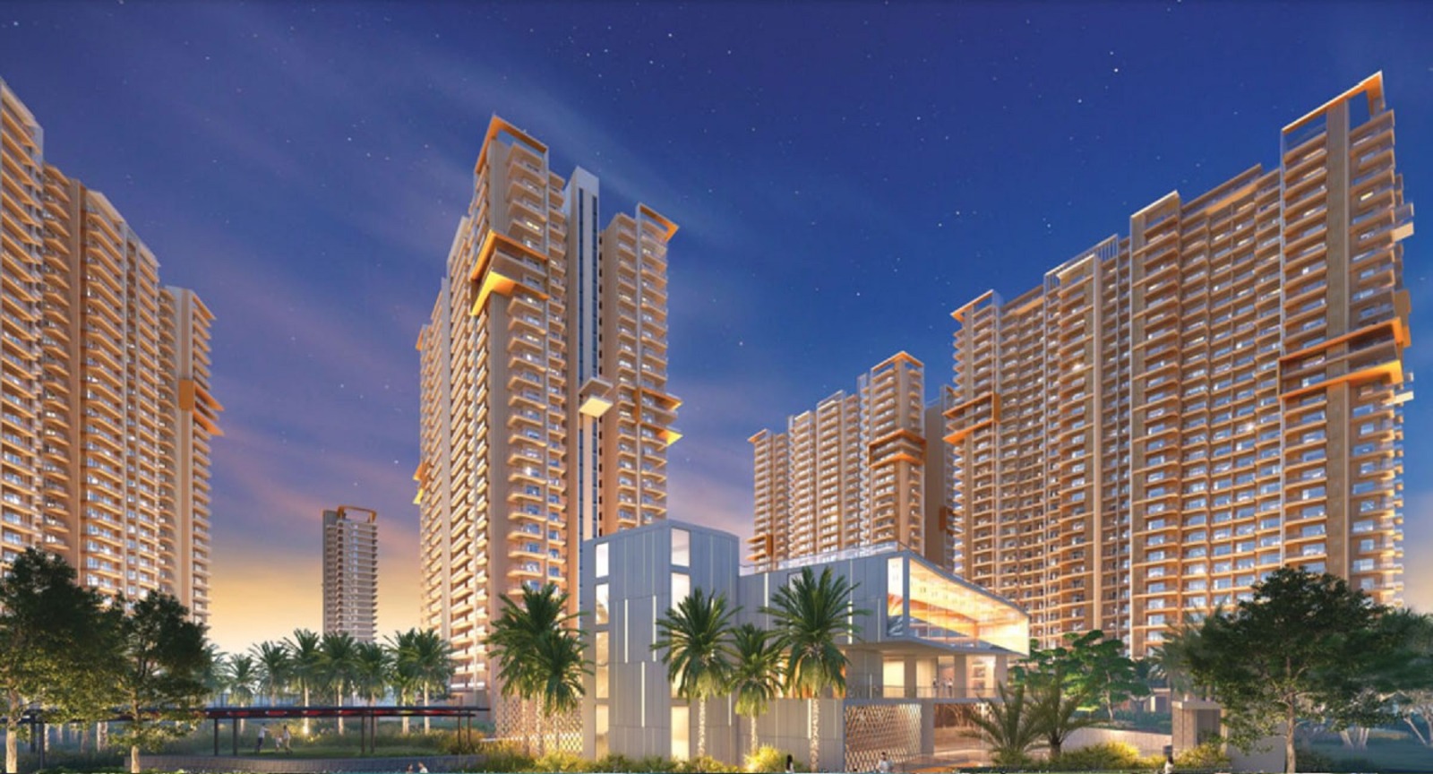 Night view of Ivory County residential towers and premium clubhouse in Noida