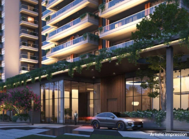 Main entrance driveway and structural drop-off zone of Northwind Sanctuary luxury high-rise towers with green balcony planters