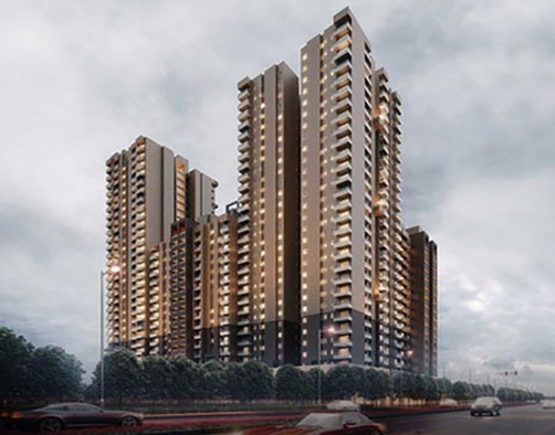Wave Amore premium apartment towers at dusk